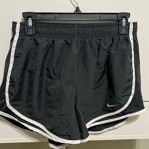 Women’s Nike dri-fit shorts size large in dark gray color